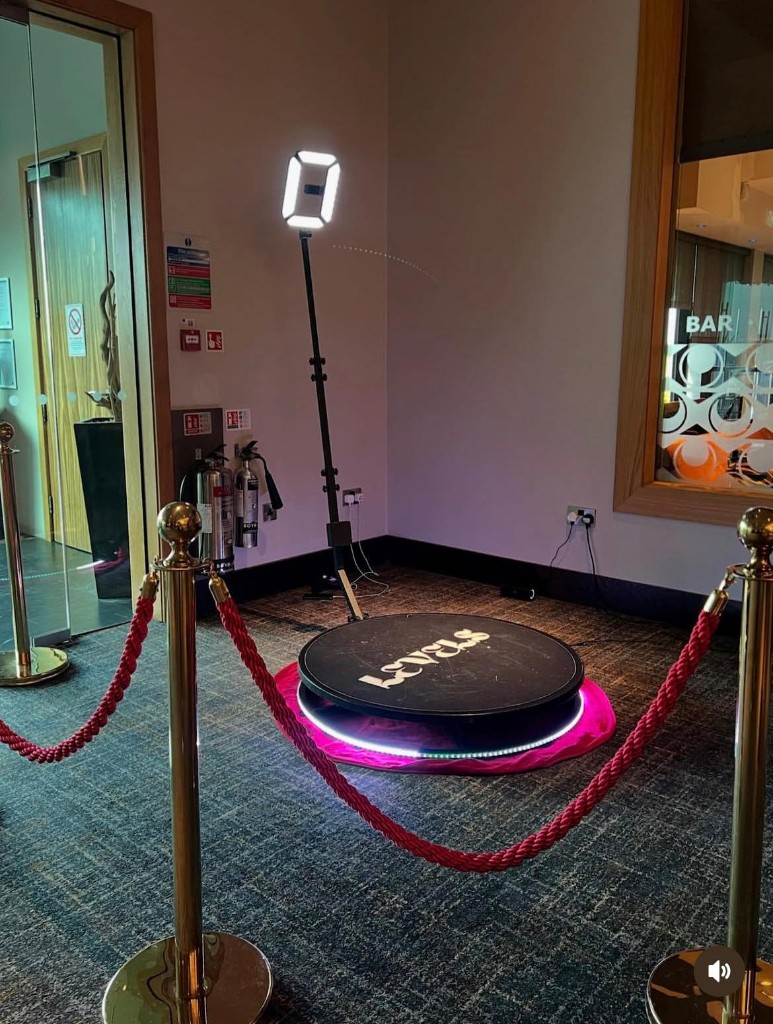 Platform, stanchions, and professional lighting