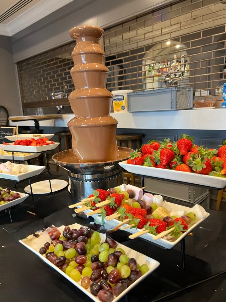 Levels 360 Video Booth with package banner and gold ropes